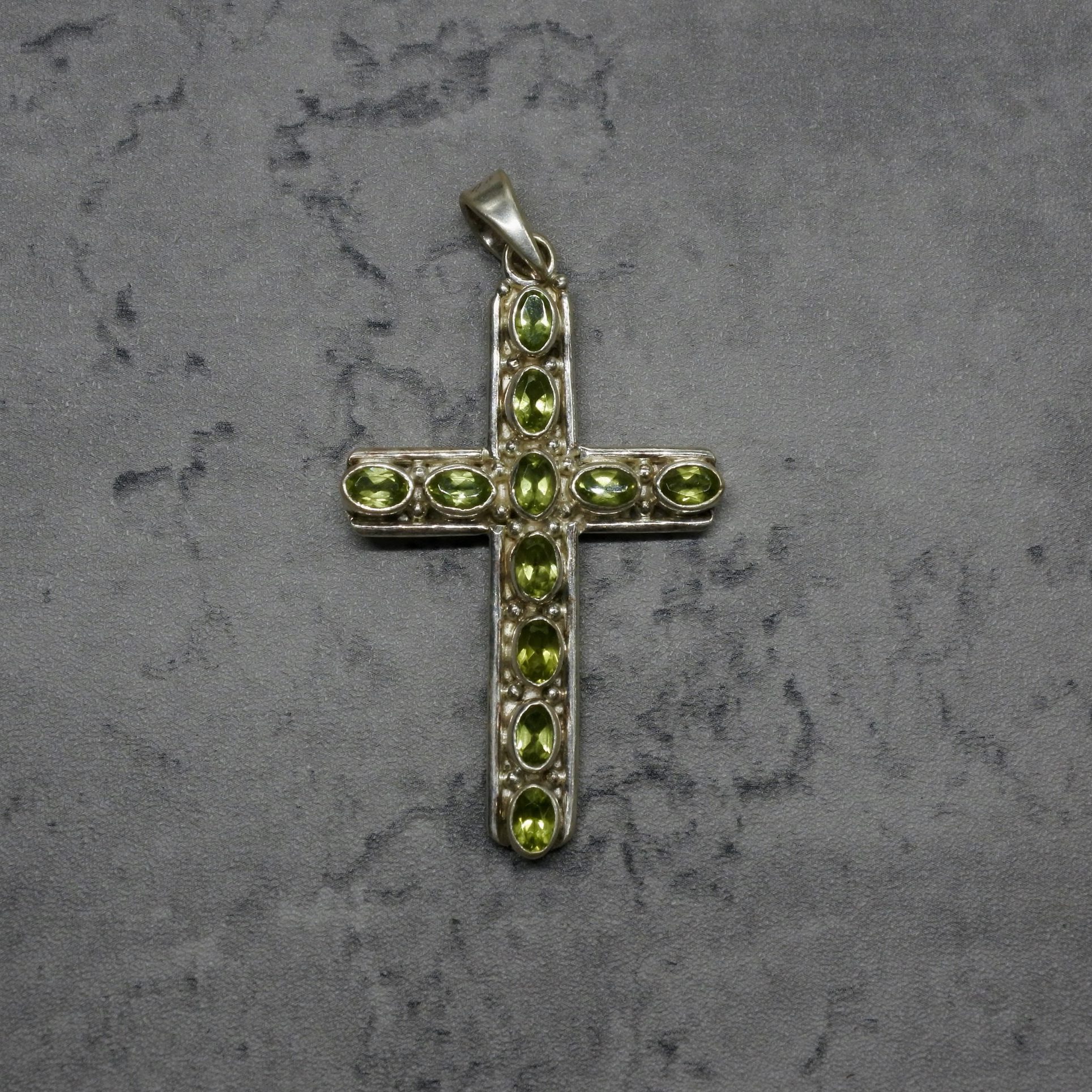 Peridot stone cross